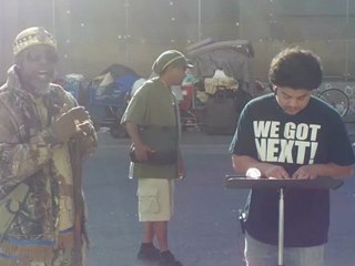 PRIEST THAAHWAM AND ERWIN ON SKID ROW FEEDING THE HOMELESS # 1