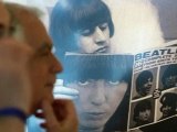 Never before seen Beatles photos go on display in New York.