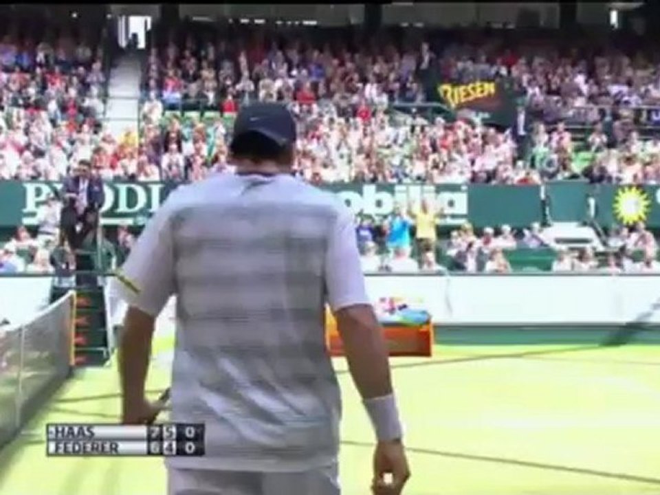 Haas shocks Federer to win Halle title