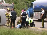 Rollover accident Wheeler-Woman transported Hospital