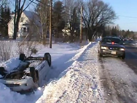 Vehicle on roof Hillsboro Road then another car goes off the road , Riverview NB