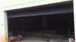 Porte de garage Sectionnelle plafond, type Euro style Ral 7016 posée par APG Accès Portes de Garage