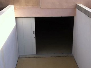 Porte de garage Latérale Novoferm motorisée.