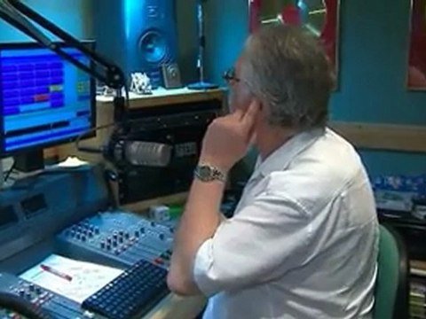 British DJ Dave Lee Travis meets 'fan' Aung San Suu Kyi