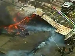 Firefighters battle blaze on San Francisco waterfront.