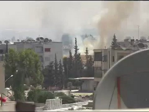 Syria فري برس حماه المحتلة ثصف ودخان يتصاعد من حي جنوب الملعب 20 6 2012 Hama