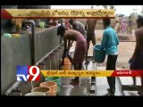 Basar IIIT students take bath on road