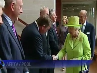 Queen in historic handshake with ex-IRA commander