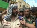 كتائب القذافي تستخدم أهالي سرت دروعا