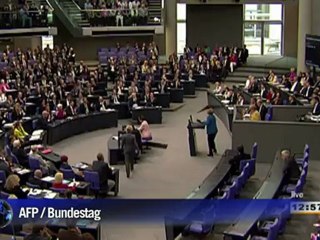 Merkel martèle contre des solutions de facilité à la crise