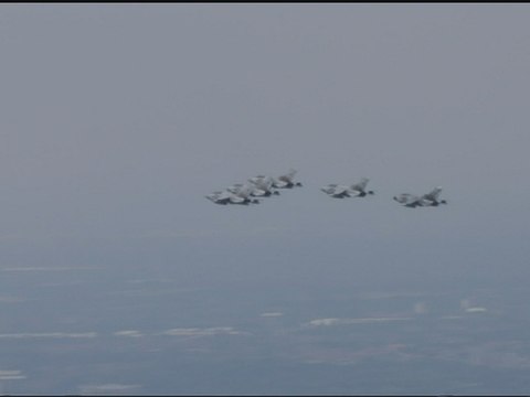 Lancaster Bomber drops thousands of poppies in flypast