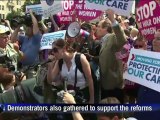 Protests as US Supreme Court upholds health reform
