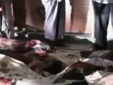 Corpses line Syrian town of Douma