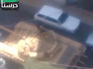 Скачать видео: Syria فري برس   ريف دمشق حرستا   29 6 2012   مرور الدبابات على الشارع العام 2 Damascus