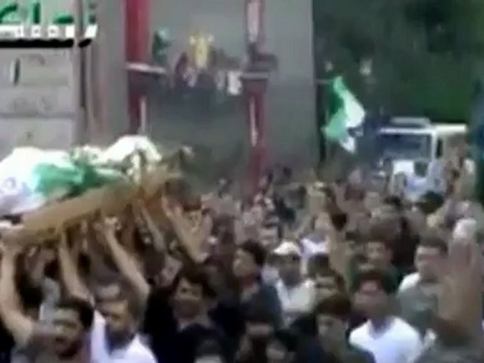 A funeral under attack in Syria