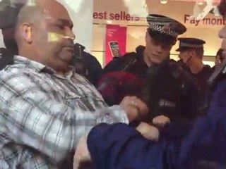 ANGRY MAN SMASHES UP T-MOBILE SHOP MANCHESTER