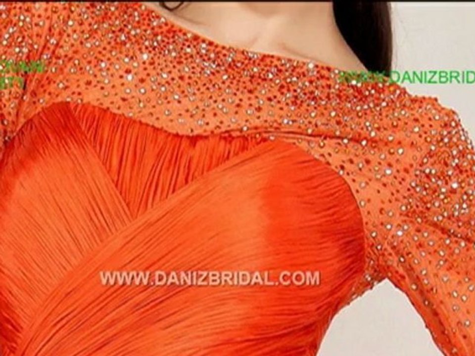 Jovani 4871 Evening Dress 2012.Long sleeve floor length gown features beaded embellishment on the neckline and sleeves, top bodice features cross over ruching with small pleated skirt.