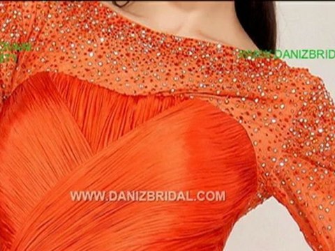 Jovani 4871 Evening Dress 2012.Long sleeve floor length gown features beaded embellishment on the neckline and sleeves, top bodice features cross over ruching with small pleated skirt.