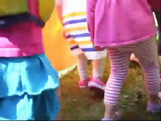 Kids form human dragon dance for Vancouver Canada Day in the park