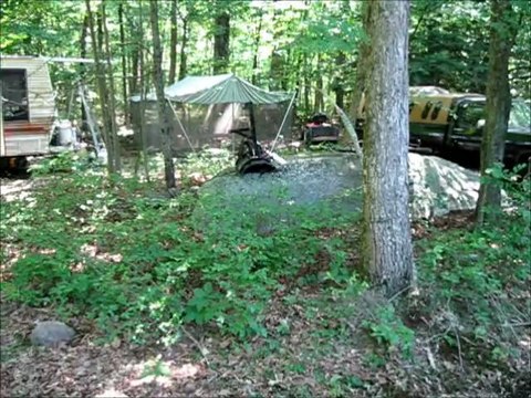 Living in a camper deep in the woods and off the grid