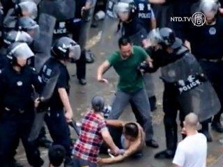 China Threatens Severe Punishment for Sichuan Protesters