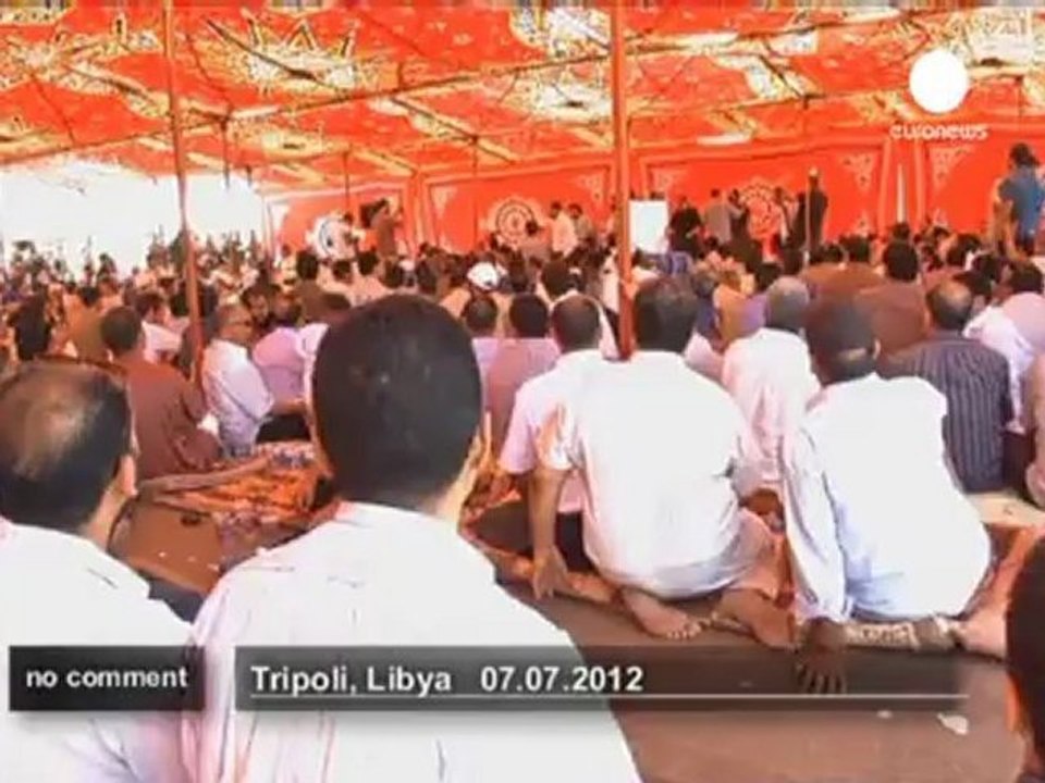 Libyans queue to vote in first... - no comment