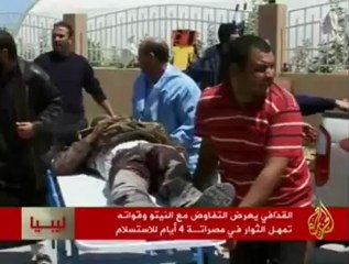 القذافي يعرض التفاوض مع النيتو وقواته تمهل الثوار