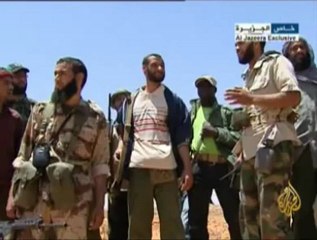 معارك ضارية بين الثوار وكتائب القذافي