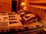 Pigeon Forge Tennessee cabin rentals smoky cozy main  bed