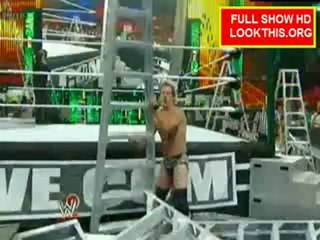 Big Show burried under ladders