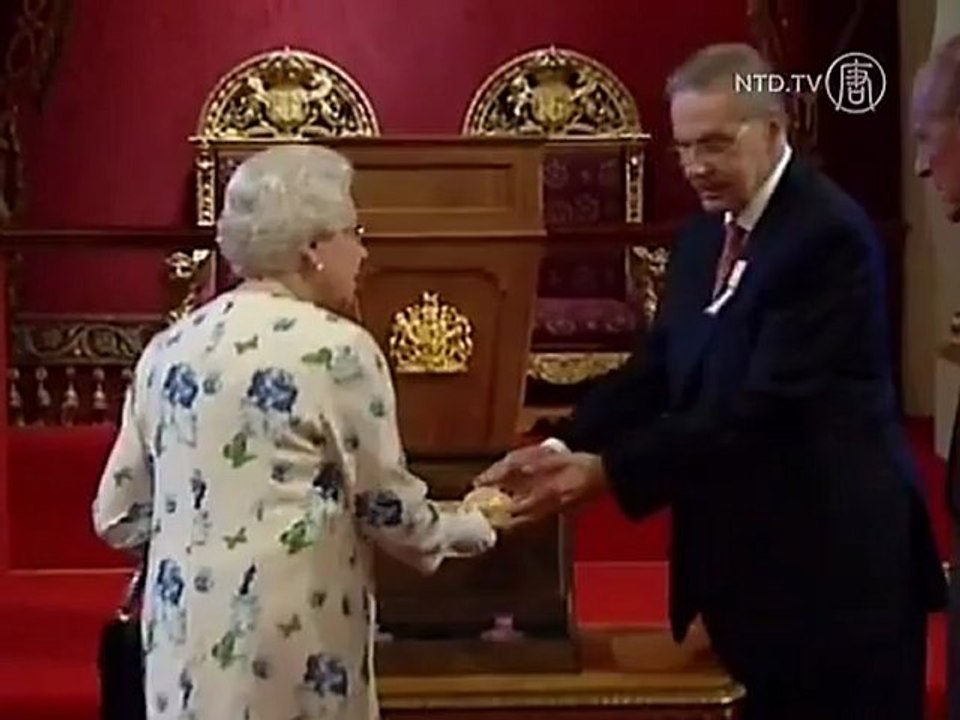 Queen Receives IOC Members at Buckingham Palace