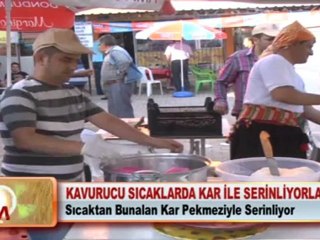 KAVURUCU SİCAKLARDA KAR İLE SERİNLİYORLAR