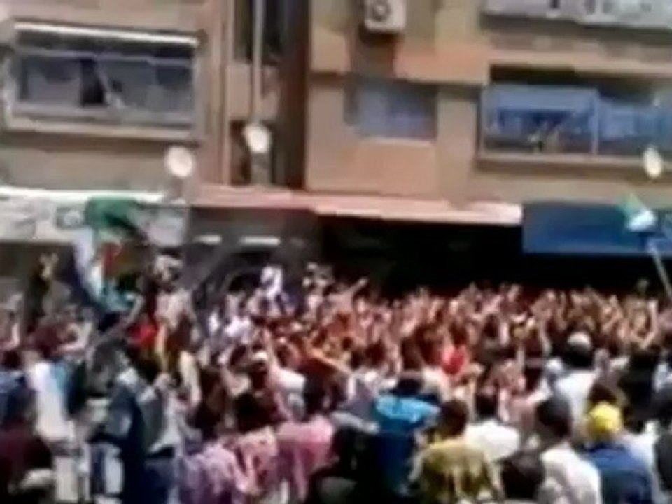 Rebels taking up arms in Syria