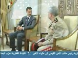 State TV shows Assad meeting new army chief.