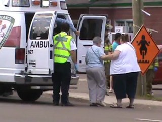 Paramedics checking Elderly couple Accident Gorge & Mountain