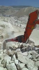 Arnes ve MTB hidrolik kaya kırıcıları ile mermere şekil verin