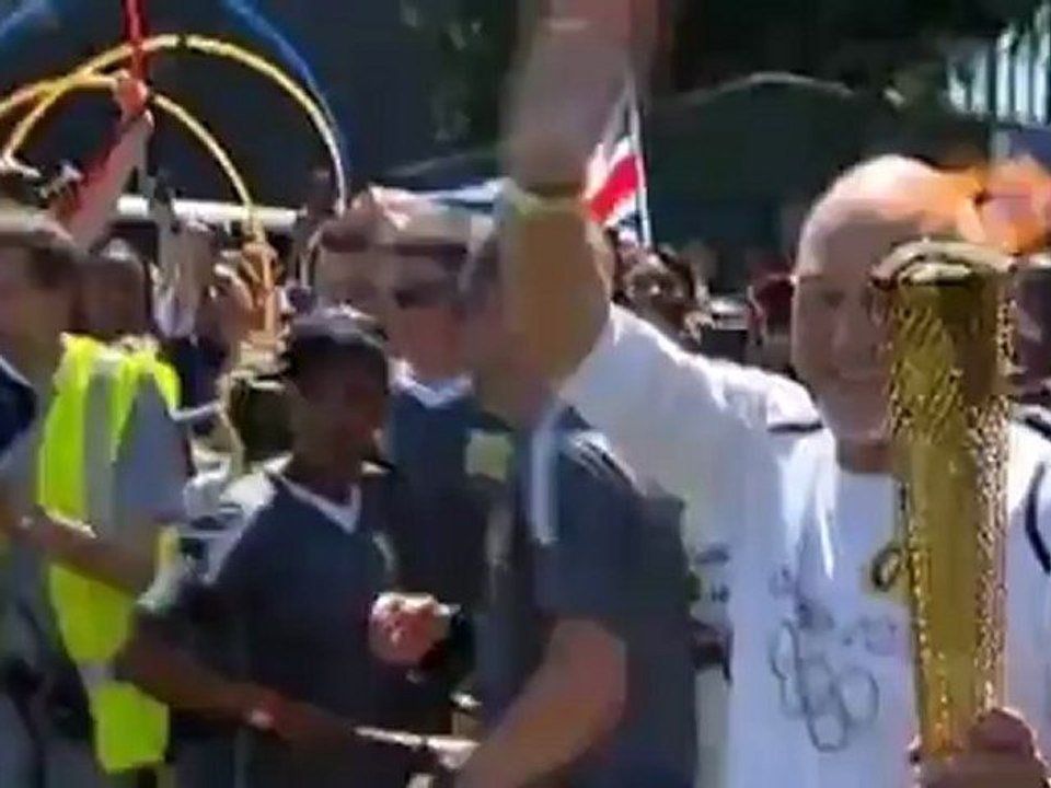 Patrick Stewart Carries Olympic Torch in London