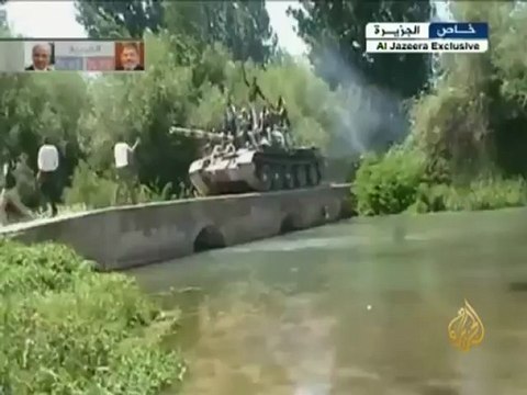 الجيش السوري الحر يستولى على عتاد جنود نظاميين