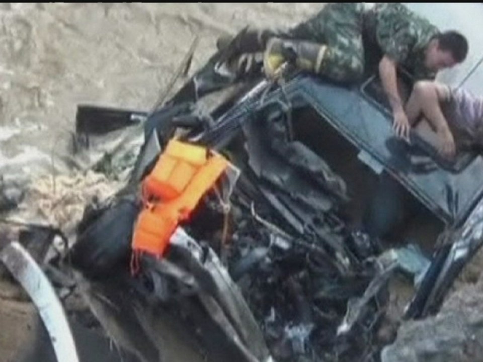 Wedding party's cars plunge into river as bridge collapses