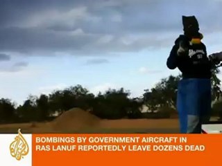 Bombs fall on Libya's Ras Lanuf