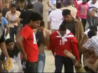 Bahrain protesters hit by tear gas