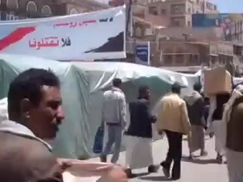 Protesters enter Sanaa's Change Square before Friday prayers
