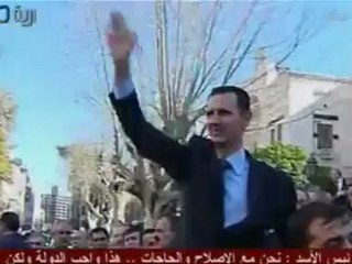 Woman Confronts Assad After Speech 🚗