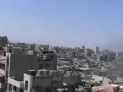 Syria فري برس حمص جورة الشياح انفجار الصروخ وخروج دخان اصفر23 7 2012 Homs