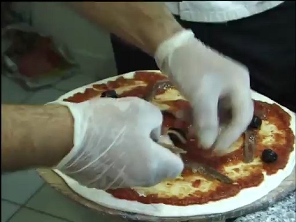 Luc Garcia sait mettre la main à la pâte ...à pizza !