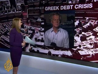 Greek PM addresses parliament as protest continues