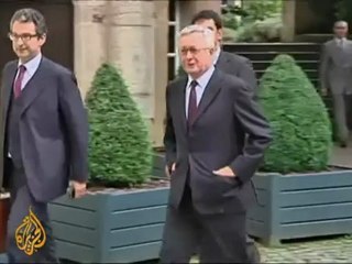 Italy struggles through debt crisis