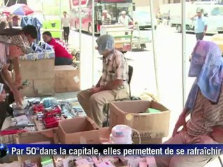 Bagdad: des douches en pleine rue pour supporter la chaleur