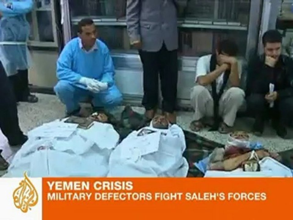 Military defectors fight Saleh's forces