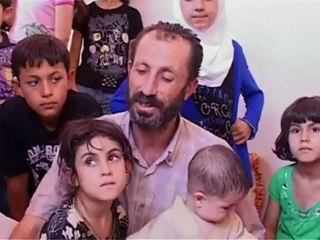 Hundreds of Syrian refugees arrive in Iraq